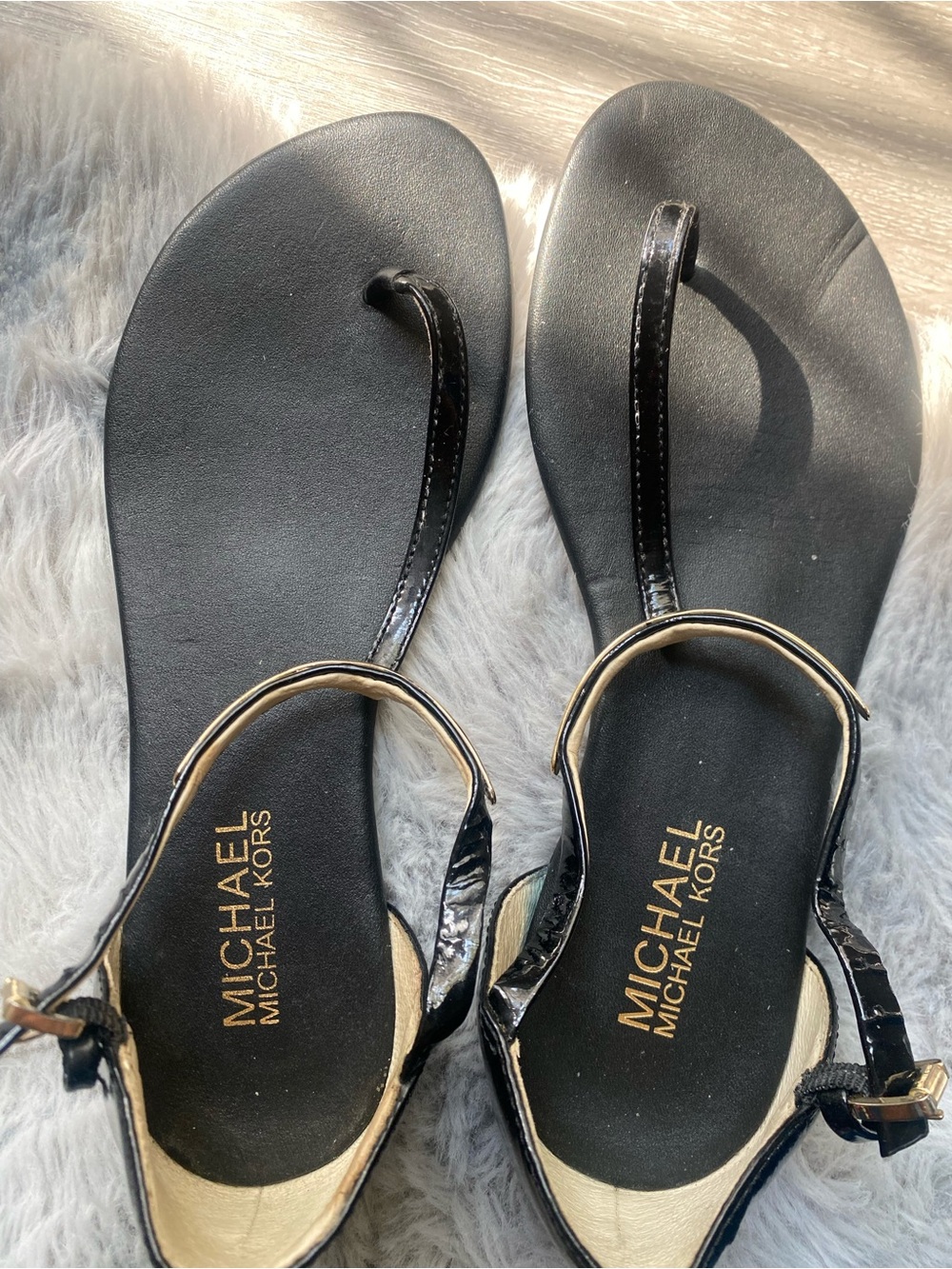 MICHAEL Michael Kors Black Patent Leather Thong Sandals with Gold Accents